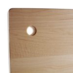 Small wood cutting board with a hole to hang it with.