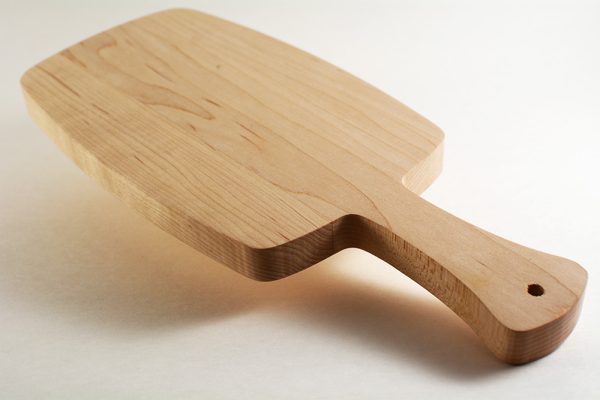 Small wooden bread board with handel profile