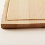 Bar cutting board with full juice groove on the four edges in maple hardwood