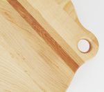 Wooden pizza board close up